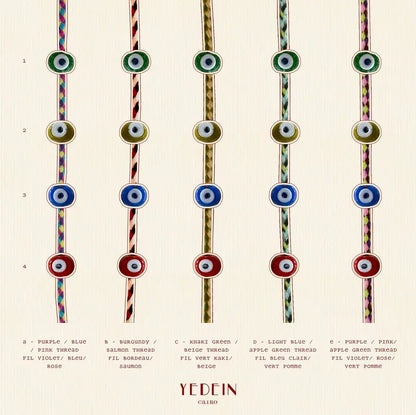 Différentes variantes des bracelets œil sur fond crème
